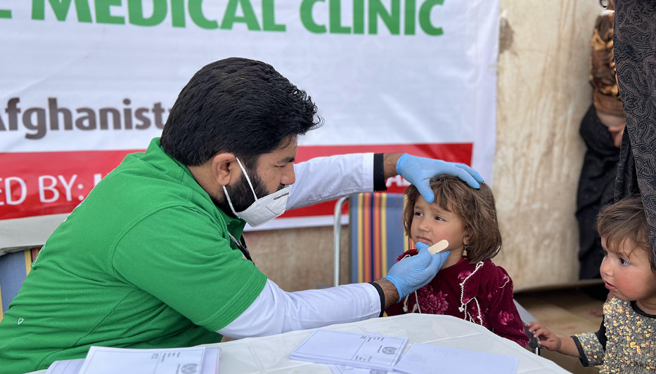 Medical professionals providing essential healthcare in an outreach clinic