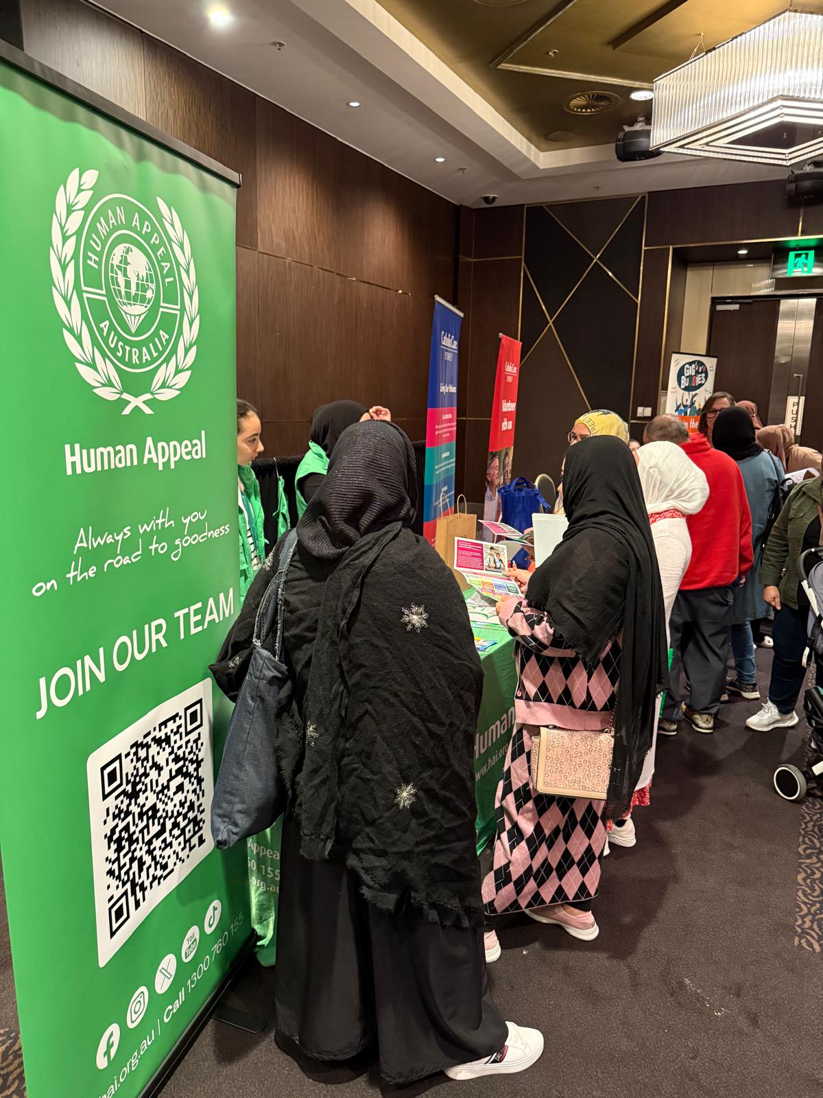 Human Appeal Australia volunteer at a community event